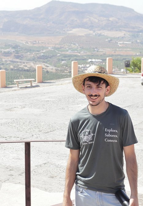 Friendly guide interacting with tourists Malaga Wine Tour